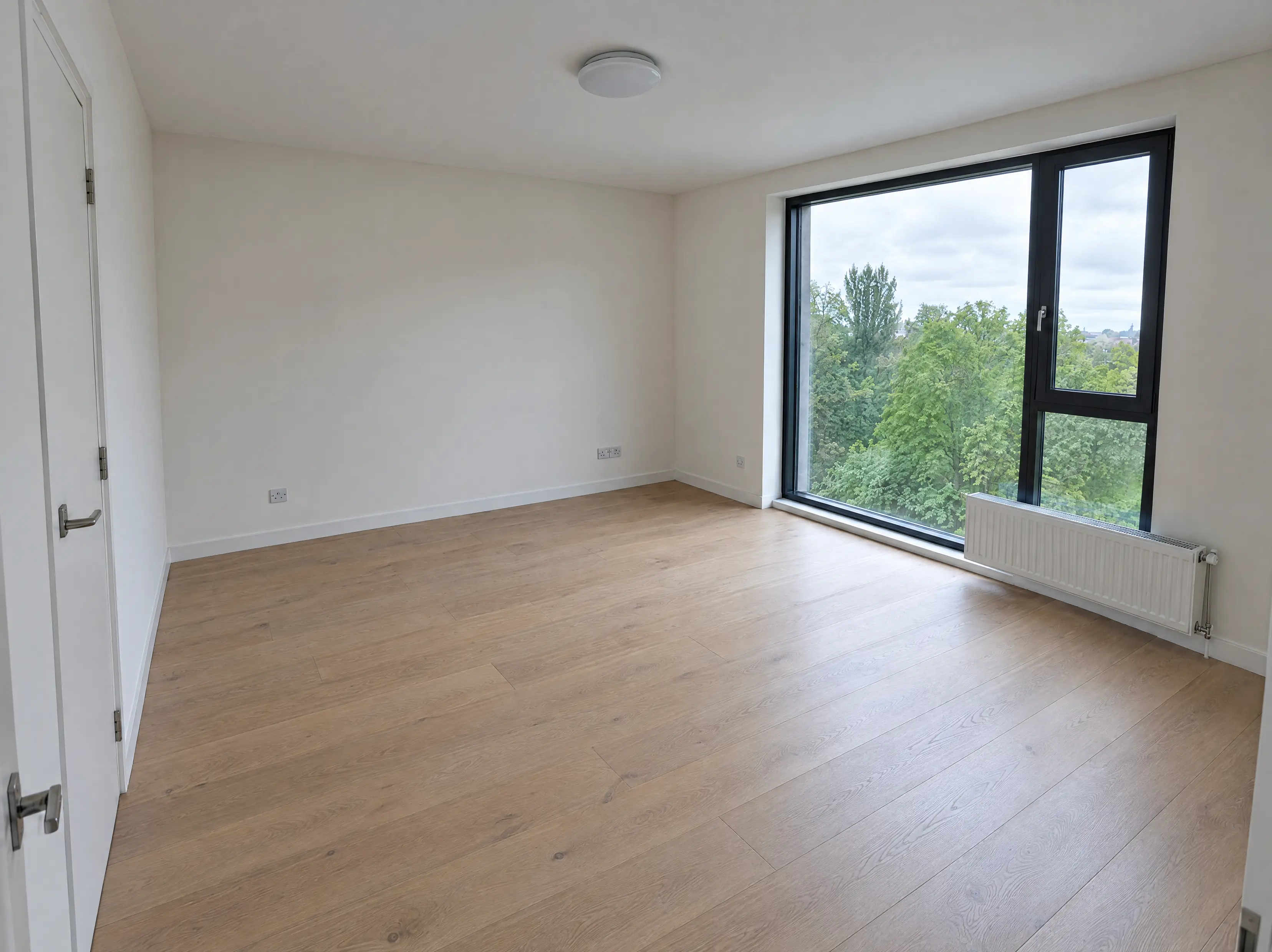 A real living room photographed on a phone, before any redesign